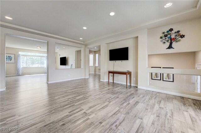 8565 Silver Coast St, Las Vegas, NV 89139 - unfurnished living room featuring wood finished floors and recessed lighting