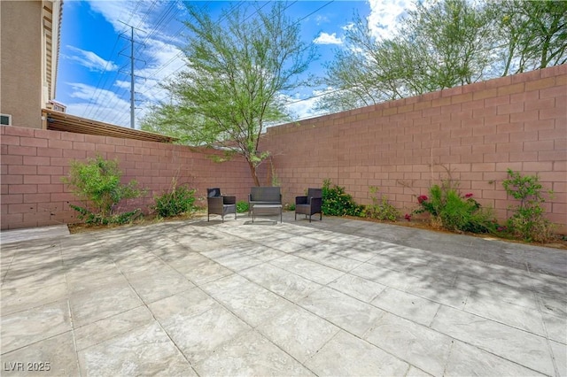 8565 Silver Coast St, Las Vegas, NV 89139 - fenced backyard featuring a patio