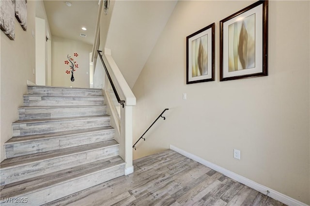 8565 Silver Coast St, Las Vegas, NV 89139 - stairs featuring wood finished floors and recessed lighting