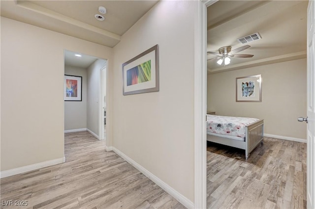 8565 Silver Coast St, Las Vegas, NV 89139 - hall featuring light wood-type flooring and baseboards