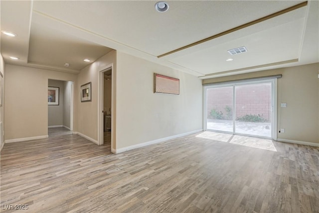 8565 Silver Coast St, Las Vegas, NV 89139 - empty room with light wood-style flooring and recessed lighting