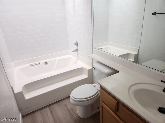 2986 Juniper Hills Blvd Unit 202, Las Vegas, NV 89142 - bathroom featuring wood finished floors, vanity, and bathing tub / shower combination