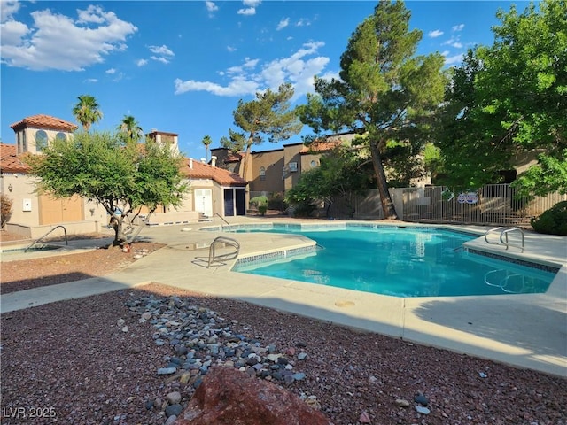 2986 Juniper Hills Blvd Unit 202, Las Vegas, NV 89142 - community pool with a patio area