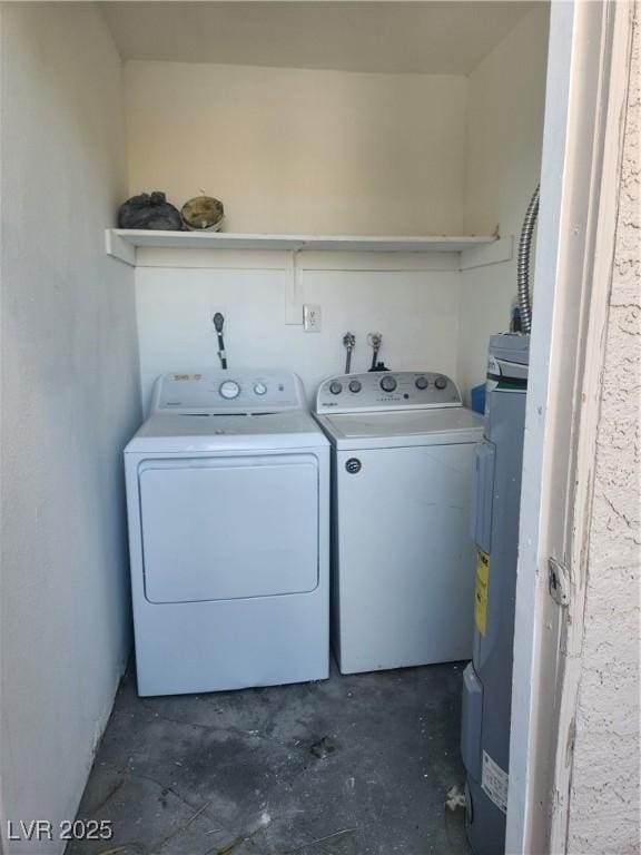 2986 Juniper Hills Blvd Unit 202, Las Vegas, NV 89142 - laundry area with washer and clothes dryer and water heater