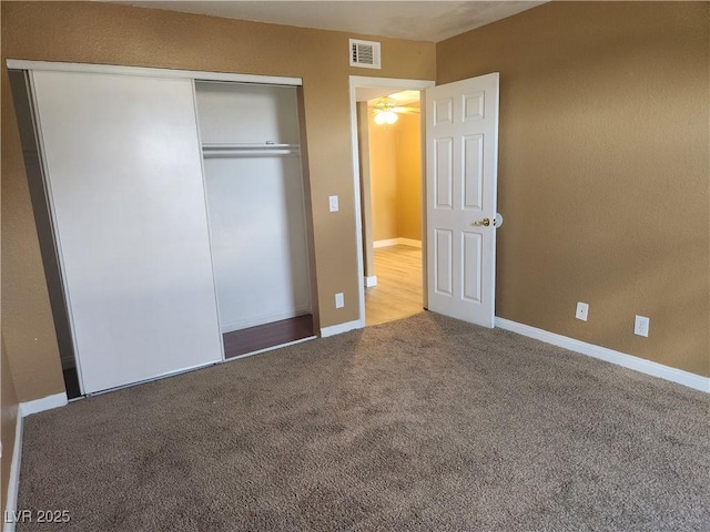 2986 Juniper Hills Blvd Unit 202, Las Vegas, NV 89142 - unfurnished bedroom featuring carpet and a closet