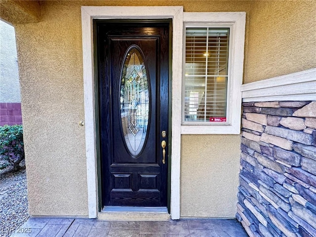 5361 Candlespice Way, Las Vegas, NV 89135 - view of exterior entry with stucco siding