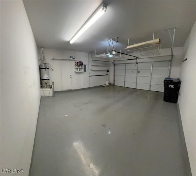 5361 Candlespice Way, Las Vegas, NV 89135 - garage with strapped water heater and a garage door opener