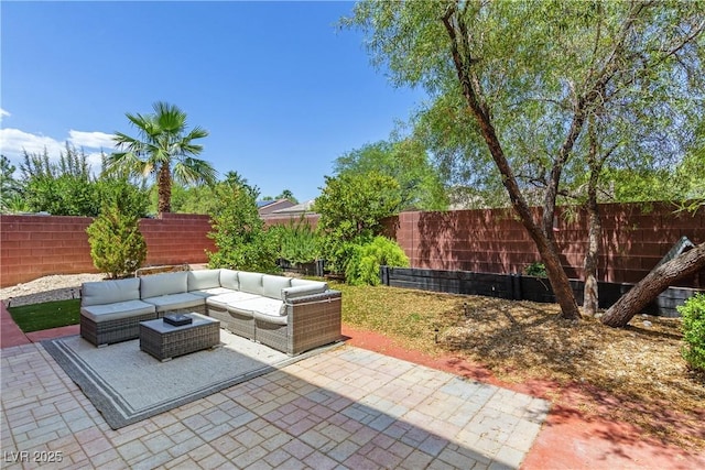 10368 Mystic Pine Rd, Las Vegas, NV 89135 - fenced backyard with an outdoor living space and a patio