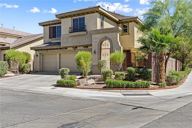 3405 Brook Song Ave, North Las Vegas, NV 89081 - mediterranean / spanish house featuring stucco siding, driveway, and an attached garage