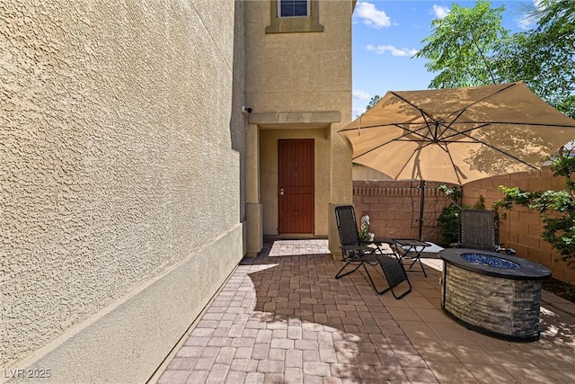 3405 Brook Song Ave, North Las Vegas, NV 89081 - view of patio featuring a fire pit