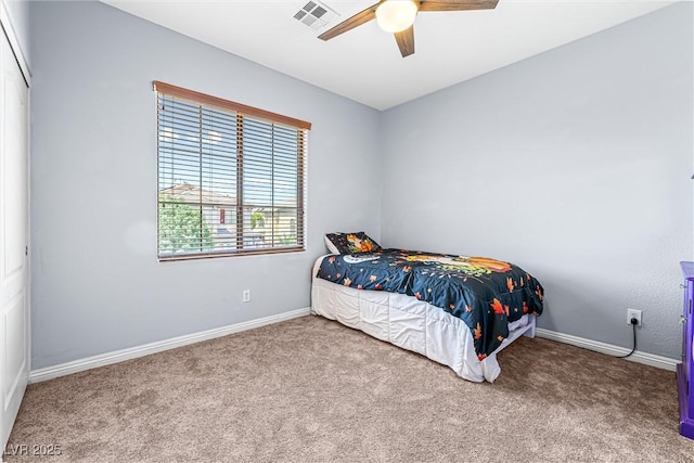 3405 Brook Song Ave, North Las Vegas, NV 89081 - carpeted bedroom with baseboards and a ceiling fan