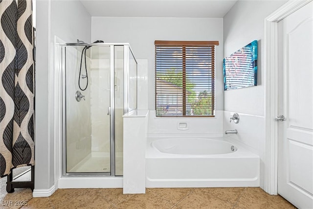 3405 Brook Song Ave, North Las Vegas, NV 89081 - bathroom with a shower stall, a garden tub, and tile patterned flooring