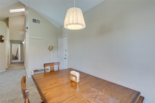 2925 Wigwam Pkwy Unit 1124, Henderson, NV 89074 - dining space featuring high vaulted ceiling, a skylight, and light carpet