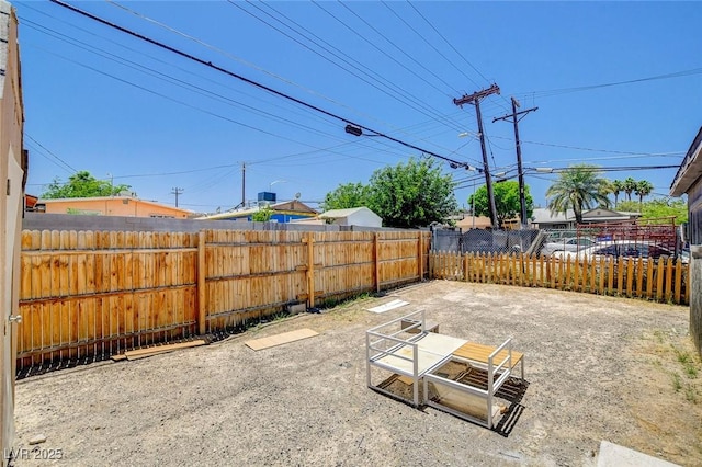 1708 Cedar Ave, Las Vegas, NV 89101 - fenced backyard featuring a patio area