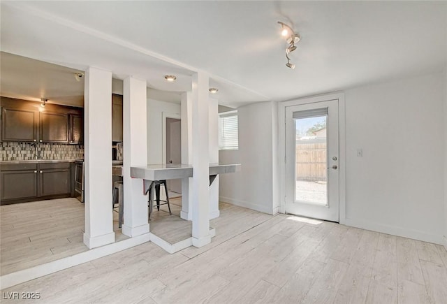 1708 Cedar Ave, Las Vegas, NV 89101 - unfurnished dining area with light wood-style floors