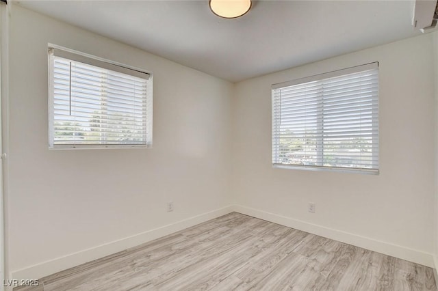 1708 Cedar Ave, Las Vegas, NV 89101 - spare room with plenty of natural light and light wood finished floors