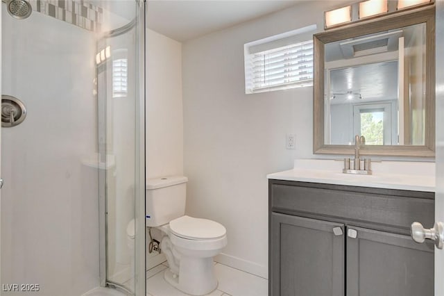 1708 Cedar Ave, Las Vegas, NV 89101 - bathroom featuring a shower stall, vanity, and tile patterned flooring
