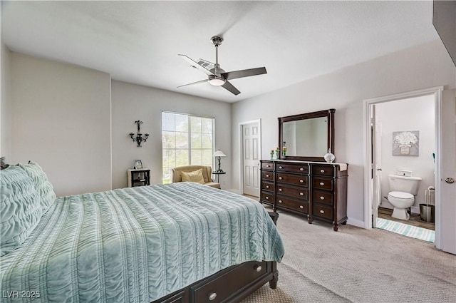 5220 Melbourne Ridge Ct, Las Vegas, NV 89141 - carpeted bedroom with ensuite bathroom and ceiling fan