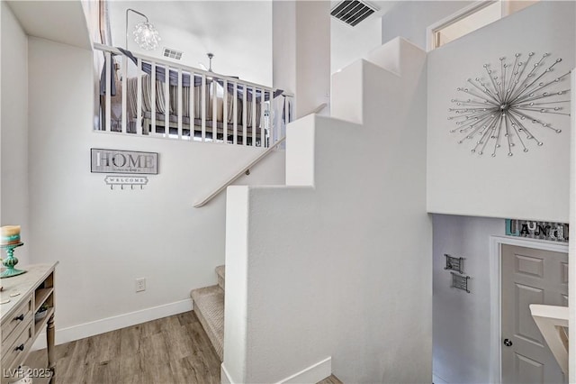 5220 Melbourne Ridge Ct, Las Vegas, NV 89141 - stairs featuring wood finished floors and baseboards