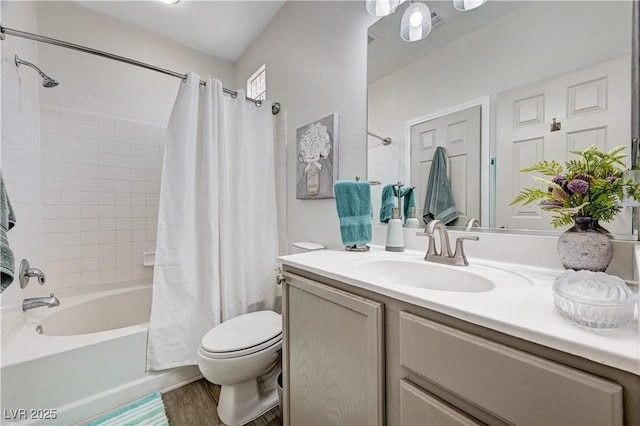 5220 Melbourne Ridge Ct, Las Vegas, NV 89141 - bathroom featuring vanity, shower / bathtub combination with curtain, and wood finished floors