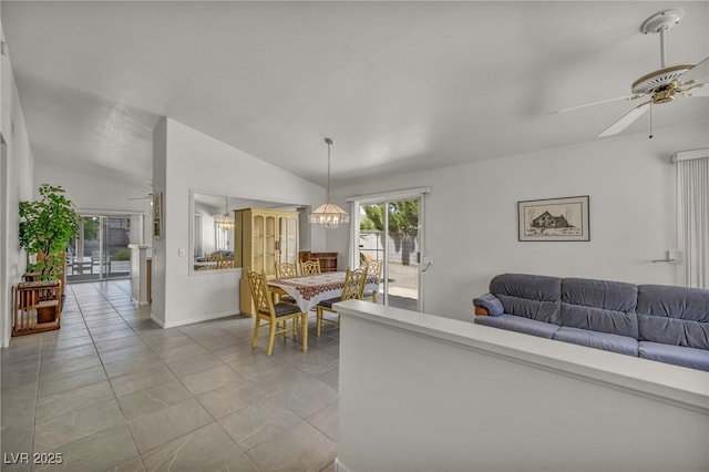 5139 Zapata Ln, North Las Vegas, NV 89031 - dining space featuring lofted ceiling, a ceiling fan, light tile patterned floors, and a chandelier
