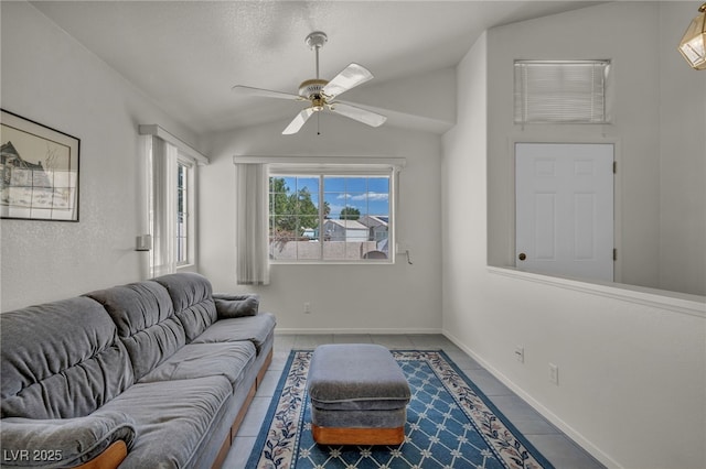 5139 Zapata Ln, North Las Vegas, NV 89031 - tiled living room featuring lofted ceiling and a ceiling fan