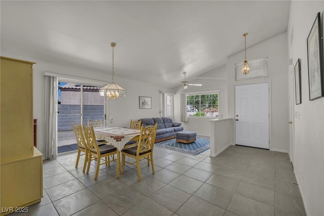 5139 Zapata Ln, North Las Vegas, NV 89031 - dining area featuring lofted ceiling, a chandelier, tile patterned flooring, and a ceiling fan