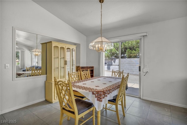 5139 Zapata Ln, North Las Vegas, NV 89031 - dining room with a chandelier, lofted ceiling, and tile patterned flooring