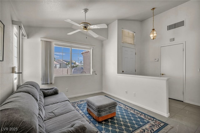 5139 Zapata Ln, North Las Vegas, NV 89031 - tiled living area with ceiling fan and lofted ceiling