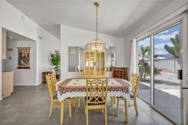 5139 Zapata Ln, North Las Vegas, NV 89031 - dining area with a chandelier and lofted ceiling