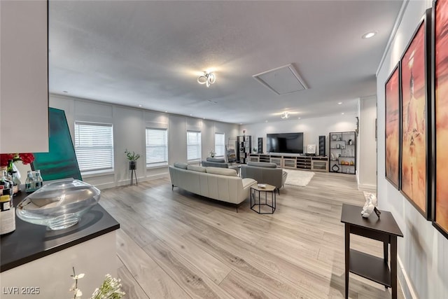 5438 Sierra Brook Ct, Las Vegas, NV 89149 - living area featuring light wood-style floors and recessed lighting