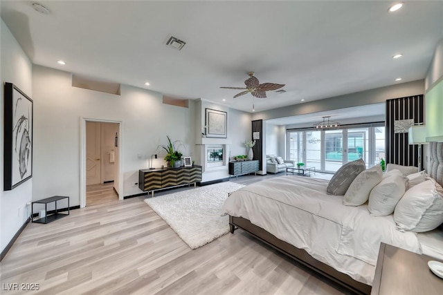 5438 Sierra Brook Ct, Las Vegas, NV 89149 - bedroom with light wood-style flooring, recessed lighting, and ceiling fan