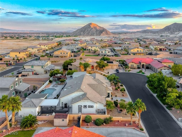 5438 Sierra Brook Ct, Las Vegas, NV 89149 - aerial view at dusk of a mountain view and a residential view