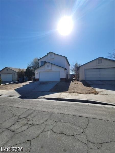 1745 Starridge Way, Las Vegas, NV 89142 - traditional-style home featuring a garage, an outbuilding, and concrete driveway