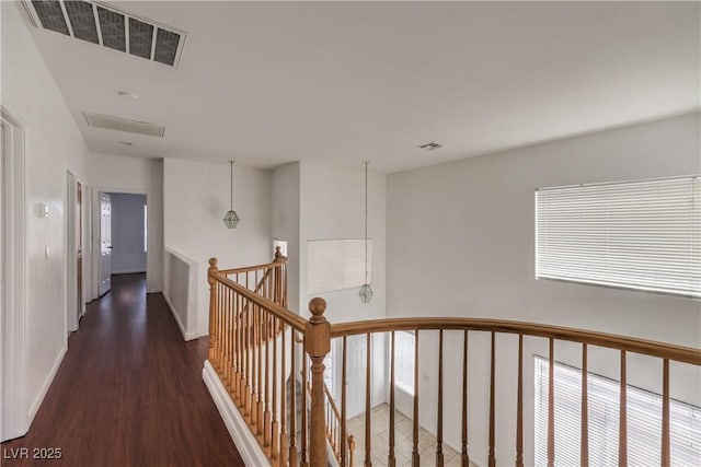 7977 Blue Brook Dr, Las Vegas, NV 89147 - corridor with an upstairs landing and wood finished floors