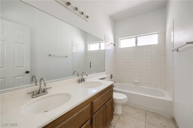 7977 Blue Brook Dr, Las Vegas, NV 89147 - bathroom featuring double vanity, tile patterned floors, and tub / shower combination