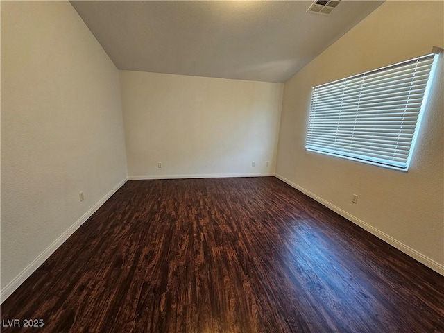6824 Briarwood Bend Ave, Las Vegas, NV 89130 - spare room with lofted ceiling and wood finished floors