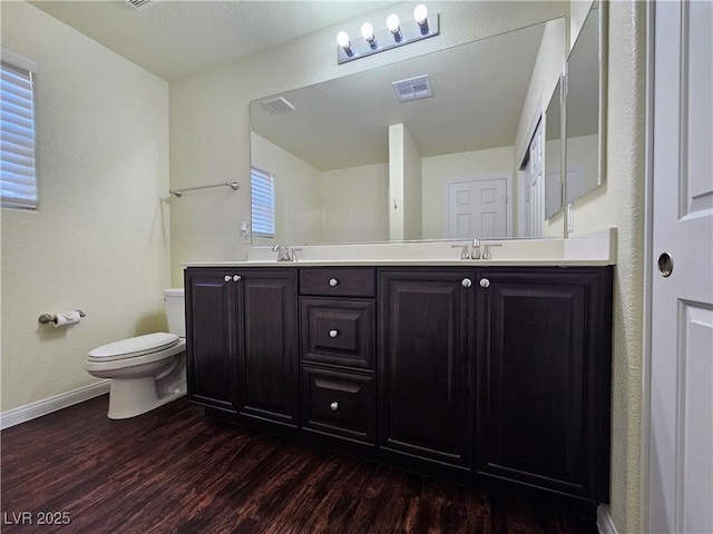6824 Briarwood Bend Ave, Las Vegas, NV 89130 - full bathroom featuring wood finished floors and double vanity
