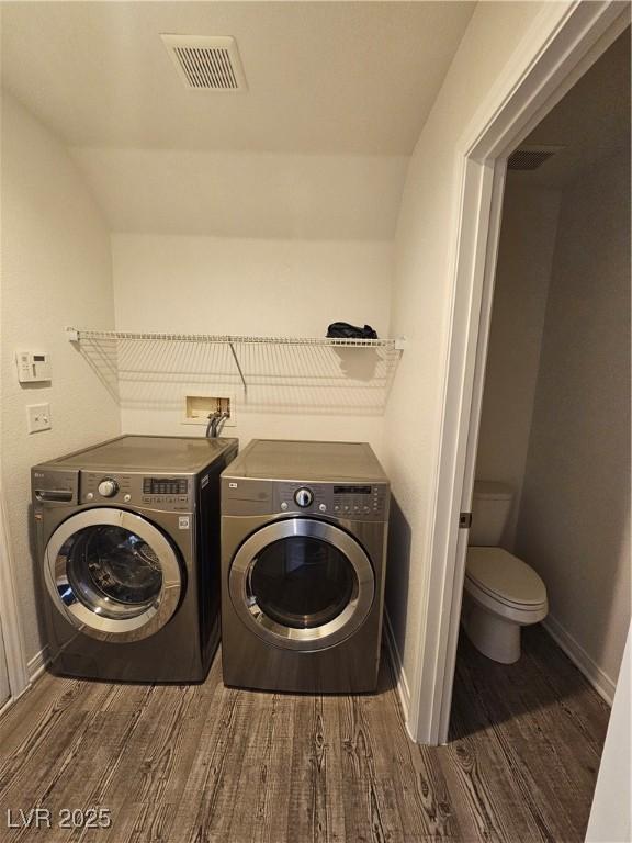 6824 Briarwood Bend Ave, Las Vegas, NV 89130 - laundry room with separate washer and dryer and wood finished floors