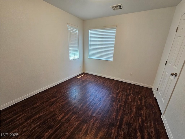 6824 Briarwood Bend Ave, Las Vegas, NV 89130 - empty room with wood finished floors and baseboards