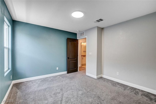10556 Sariah Skye Ave, Las Vegas, NV 89166 - unfurnished bedroom with carpet flooring and baseboards