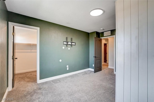 10556 Sariah Skye Ave, Las Vegas, NV 89166 - unfurnished bedroom with carpet floors, a walk in closet, and a closet