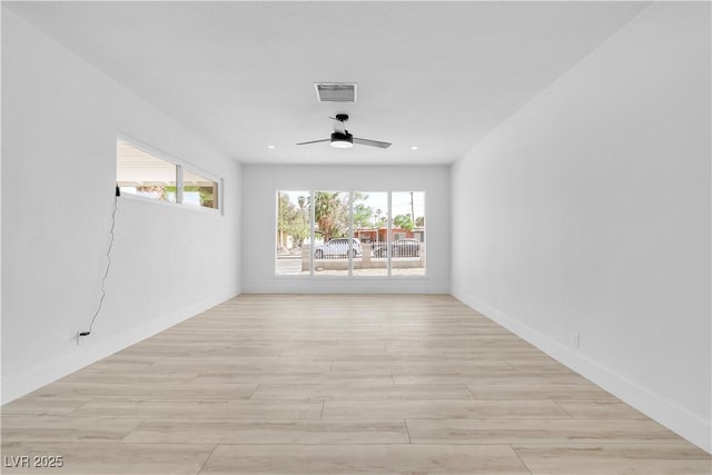 2105 Berkley Ave, Las Vegas, NV 89101 - unfurnished room with light wood-style flooring and ceiling fan