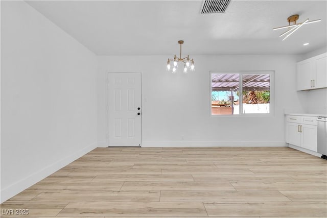 2105 Berkley Ave, Las Vegas, NV 89101 - unfurnished dining area with a chandelier, light wood-style flooring, and recessed lighting