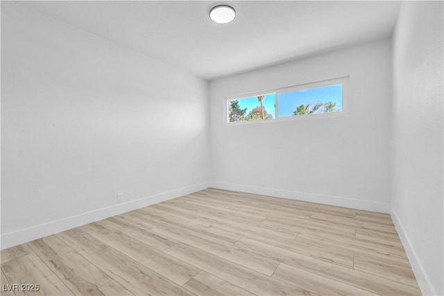2105 Berkley Ave, Las Vegas, NV 89101 - empty room featuring light wood-style flooring and baseboards