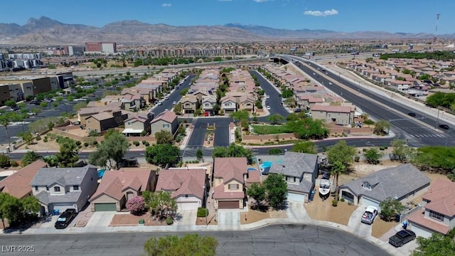 7137 Eyebright St, Las Vegas, NV 89131 - aerial view of property's location featuring nearby suburban area and a mountainous background