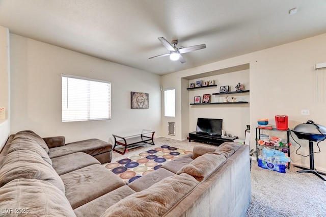 7137 Eyebright St, Las Vegas, NV 89131 - carpeted living room with a ceiling fan and baseboards