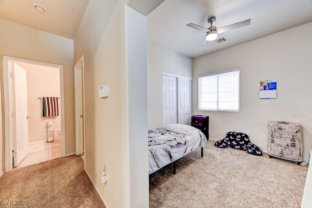 7137 Eyebright St, Las Vegas, NV 89131 - carpeted bedroom featuring a closet, ceiling fan, and ensuite bath