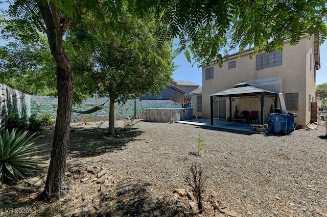 7137 Eyebright St, Las Vegas, NV 89131 - view of yard featuring a gazebo and a patio area