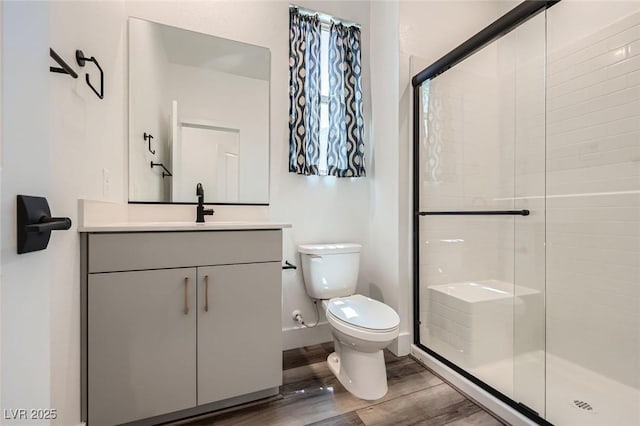 1213 Granite Falls Pl, North Las Vegas, NV 89084 - bathroom featuring wood finished floors, vanity, and a stall shower
